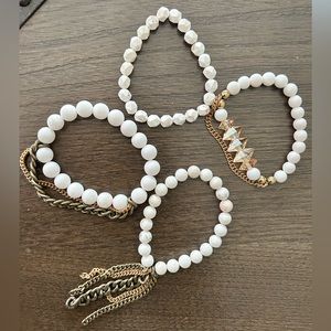 White and gold/bronze bracelet